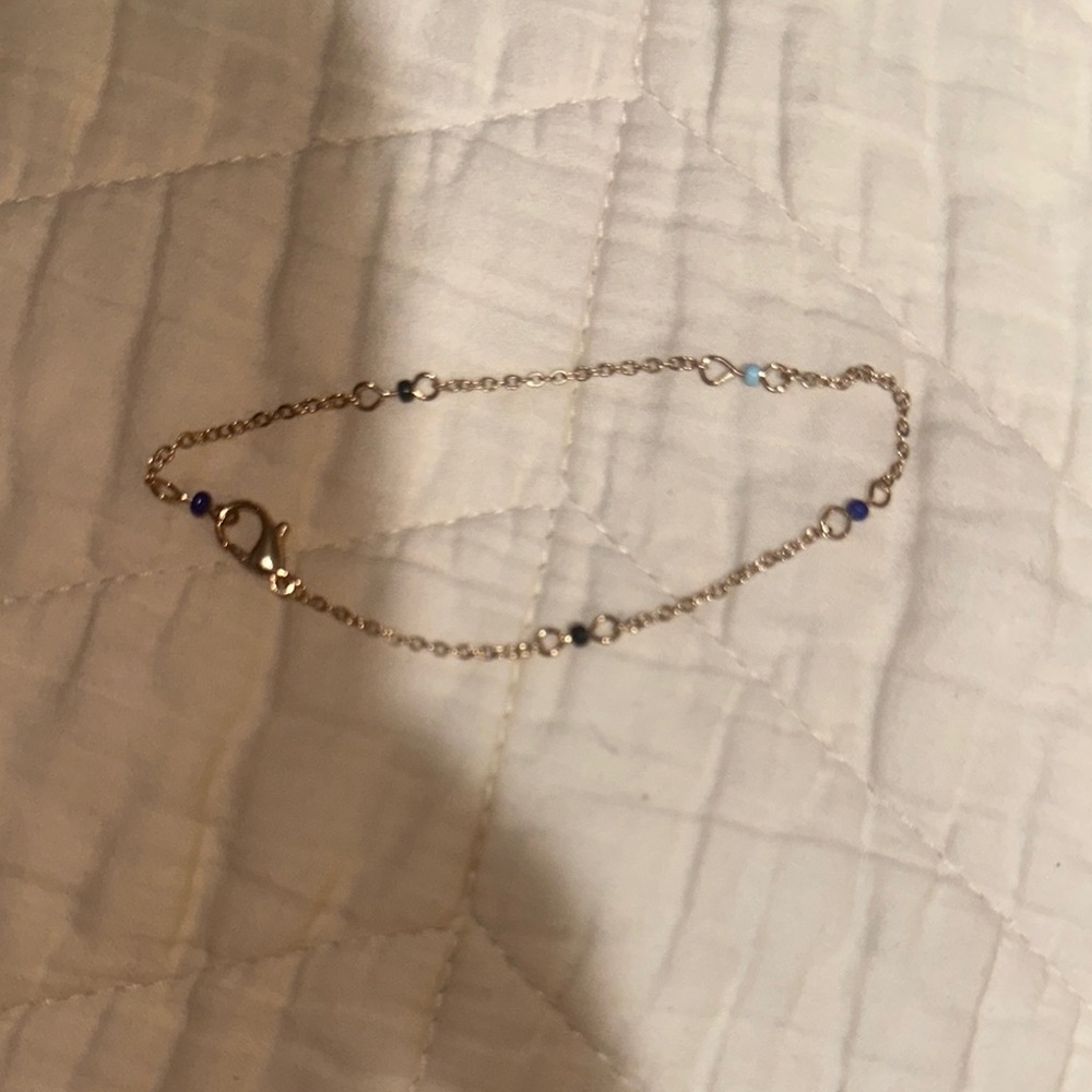 Elegant Gold and Purple Bracelet